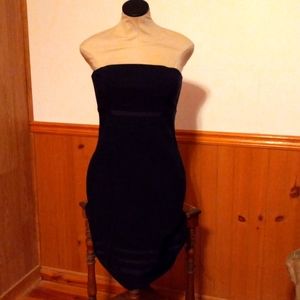 Strapless, black cocktail dress, knee length,  black ribbon trim, back zip up.